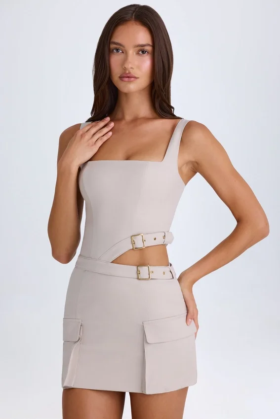 Acadia Belted Cut-Out Mini Dress in Taupe Acadia Belted Cut-Out Mini Dress in Taupe