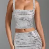 Adaia Embellished Low-Rise Micro Mini Skirt in White Adaia Embellished Low-Rise Micro Mini Skirt in White