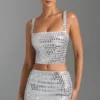 Adaia Embellished Low-Rise Micro Mini Skirt in White Adaia Embellished Low-Rise Micro Mini Skirt in White