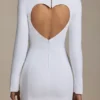 Adelia Cut-Out Heart-Detail Bodycon Mini Dress in White Adelia Cut-Out Heart-Detail Bodycon Mini Dress in White