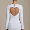 Adelia Cut-Out Heart-Detail Bodycon Mini Dress in White Adelia Cut-Out Heart-Detail Bodycon Mini Dress in White