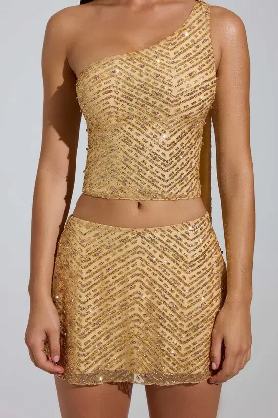 Adhara Embellished Low-Rise A-Line Micro Mini Skirt in Gold Adhara Embellished Low-Rise A-Line Micro Mini Skirt in Gold