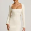 Akari Pearl-Detail Cut-Out Mini Dress in Ivory Akari Pearl-Detail Cut-Out Mini Dress in Ivory