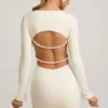 Akari Pearl-Detail Cut-Out Mini Dress in Ivory Akari Pearl-Detail Cut-Out Mini Dress in Ivory