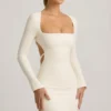 Akari Pearl-Detail Cut-Out Mini Dress in Ivory Akari Pearl-Detail Cut-Out Mini Dress in Ivory