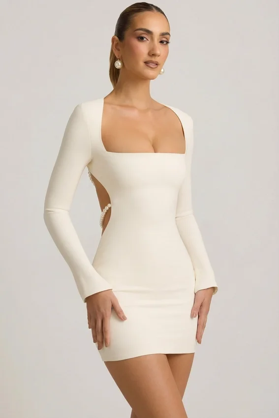 Akari Pearl-Detail Cut-Out Mini Dress in Ivory Akari Pearl-Detail Cut-Out Mini Dress in Ivory