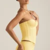 Araminta Lace-Up Corset Top in Pastel Yellow Araminta Lace-Up Corset Top in Pastel Yellow