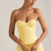 Araminta Lace-Up Corset Top in Pastel Yellow Araminta Lace-Up Corset Top in Pastel Yellow