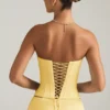 Araminta Lace-Up Corset Top in Pastel Yellow Araminta Lace-Up Corset Top in Pastel Yellow