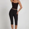 Armelia Embellished Peekaboo Cowl-Neck Top in Black Armelia Embellished Peekaboo Cowl-Neck Top in Black