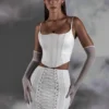 Asra Lace Up Mini Skirt in White Asra Lace Up Mini Skirt in White