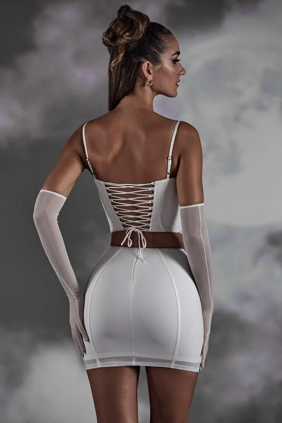 Asra Lace Up Mini Skirt in White Asra Lace Up Mini Skirt in White