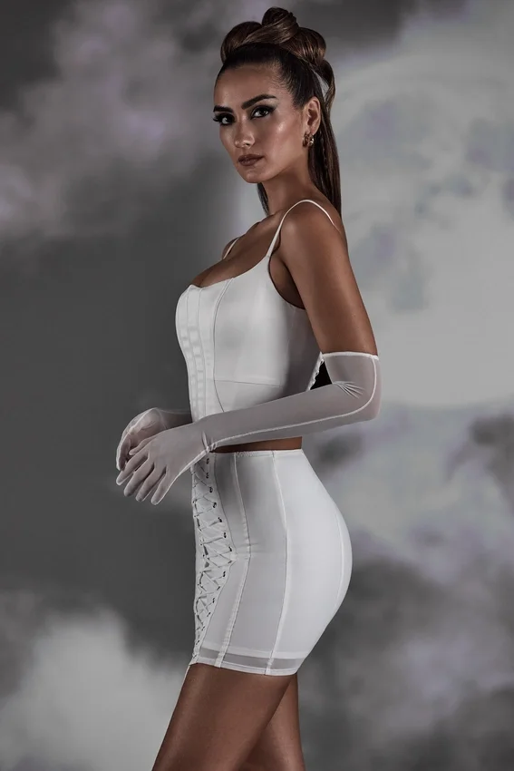 Asra Lace Up Mini Skirt in White Asra Lace Up Mini Skirt in White