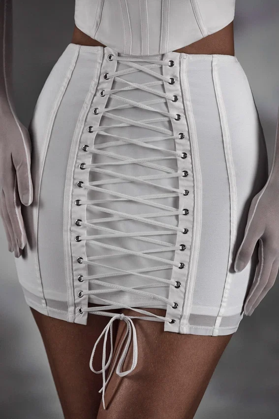 Asra Lace Up Mini Skirt in White Asra Lace Up Mini Skirt in White