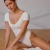 Backless Panelled Bodysuit in Soft White Backless Panelled Bodysuit in Soft White