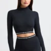 Backless Turtleneck Long-Sleeve Crop Top in Black Backless Turtleneck Long-Sleeve Crop Top in Black