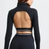 Backless Turtleneck Long-Sleeve Crop Top in Black Backless Turtleneck Long-Sleeve Crop Top in Black