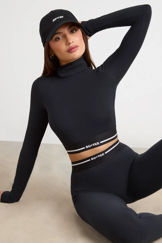 Backless Turtleneck Long-Sleeve Crop Top in Black Backless Turtleneck Long-Sleeve Crop Top in Black