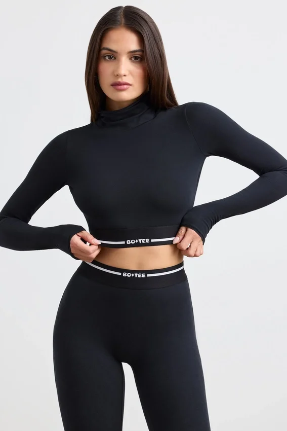 Backless Turtleneck Long-Sleeve Crop Top in Black Backless Turtleneck Long-Sleeve Crop Top in Black