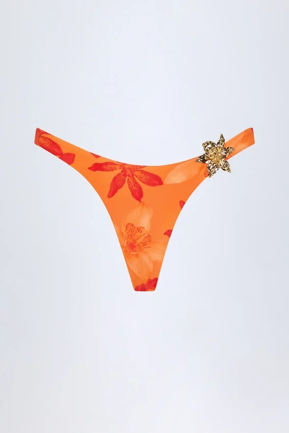 Beqa Hardware-Detail Cheeky Bikini Bottoms in Orange Orchid Print Beqa Hardware-Detail Cheeky Bikini Bottoms in Orange Orchid Print