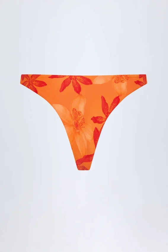 Beqa Hardware-Detail Cheeky Bikini Bottoms in Orange Orchid Print Beqa Hardware-Detail Cheeky Bikini Bottoms in Orange Orchid Print