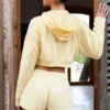 Button-Detail Mid-Rise Shorts in Lemon Button-Detail Mid-Rise Shorts in Lemon