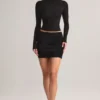 Cali Modal Ruched Mid-Rise Mini Skirt in Black Cali Modal Ruched Mid-Rise Mini Skirt in Black