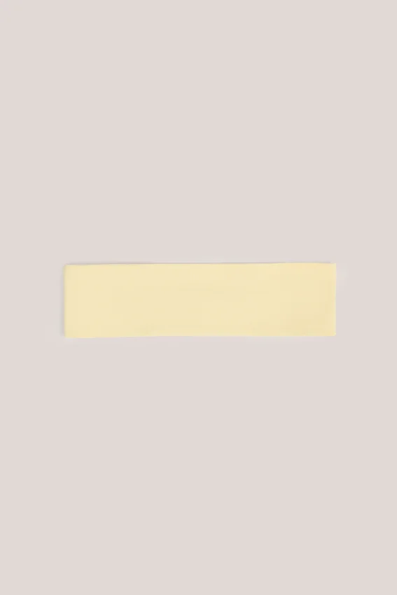 Candy Modal Ribbed Headband in Buttercream Yellow Candy Modal Ribbed Headband in Buttercream Yellow
