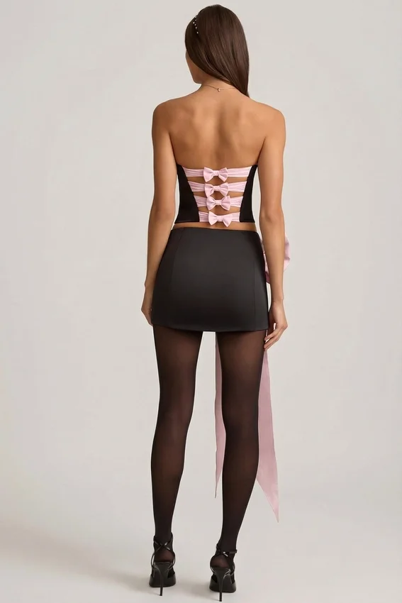 Carola Satin Bow-Detail Low-Rise Mini Skirt in Black Carola Satin Bow-Detail Low-Rise Mini Skirt in Black