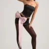 Carola Satin Bow-Detail Low-Rise Mini Skirt in Black Carola Satin Bow-Detail Low-Rise Mini Skirt in Black
