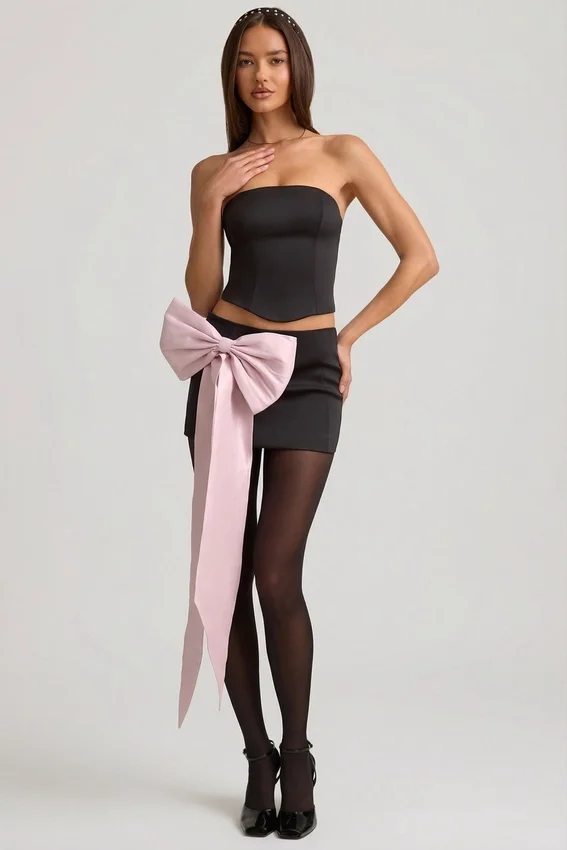 Carola Satin Bow-Detail Low-Rise Mini Skirt in Black Carola Satin Bow-Detail Low-Rise Mini Skirt in Black