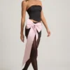 Carola Satin Bow-Detail Low-Rise Mini Skirt in Black Carola Satin Bow-Detail Low-Rise Mini Skirt in Black