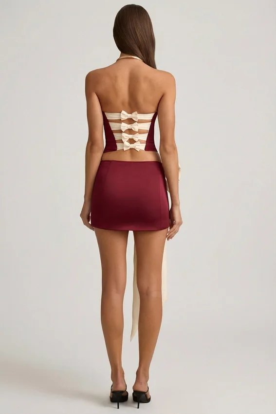 Carola Satin Bow-Detail Low-Rise Mini Skirt in Wine Red Carola Satin Bow-Detail Low-Rise Mini Skirt in Wine Red