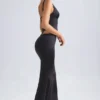 Ceres Mid-Rise Fishtail Maxi Skirt in Black Ceres Mid-Rise Fishtail Maxi Skirt in Black