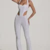 Coralena Embellished Cut-Out Jumpsuit in White Coralena Embellished Cut-Out Jumpsuit in White