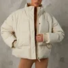 Cropped Puffer Jacket with Detachable Sleeves in Sand Cropped Puffer Jacket with Detachable Sleeves in Sand