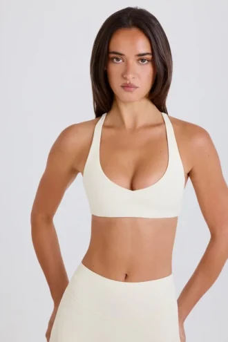 Crossback V-Neck Sports Bra in Cream Crossback V-Neck Sports Bra in Cream