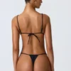 Delray Ruched Thong Bikini Bottoms in Black Delray Ruched Thong Bikini Bottoms in Black