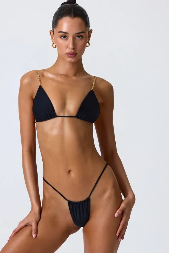 Delray Ruched Thong Bikini Bottoms in Black Delray Ruched Thong Bikini Bottoms in Black