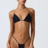 Delray Ruched Thong Bikini Bottoms in Black Delray Ruched Thong Bikini Bottoms in Black