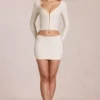 Elowise Lace Mini Skirt in Ivory Elowise Lace Mini Skirt in Ivory
