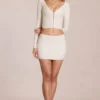Elowise Lace Mini Skirt in Ivory Elowise Lace Mini Skirt in Ivory