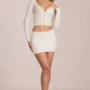 Elowise Lace Mini Skirt in Ivory Elowise Lace Mini Skirt in Ivory