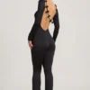 Eulalie Slinky Jersey Bow-Detail Jumpsuit in Black Eulalie Slinky Jersey Bow-Detail Jumpsuit in Black