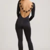 Eulalie Slinky Jersey Bow-Detail Jumpsuit in Black Eulalie Slinky Jersey Bow-Detail Jumpsuit in Black