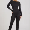 Eulalie Slinky Jersey Bow-Detail Jumpsuit in Black Eulalie Slinky Jersey Bow-Detail Jumpsuit in Black