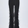 Felicity Ruffled Mid-Rise Flared Trousers in Black Felicity Ruffled Mid-Rise Flared Trousers in Black