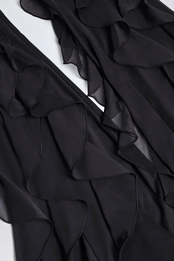 Felicity Ruffled Mid-Rise Flared Trousers in Black Felicity Ruffled Mid-Rise Flared Trousers in Black