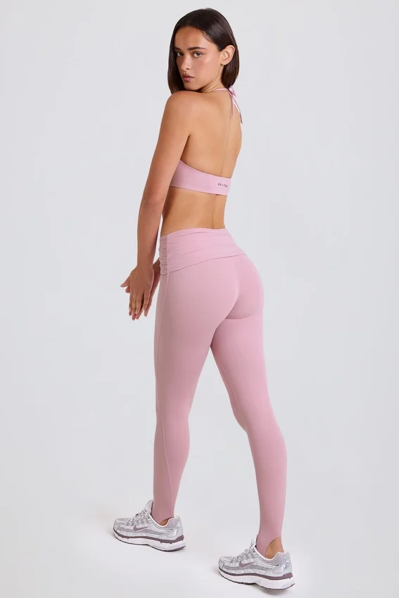 Foldover Mid-Rise Stirrup Leggings in Mauve Foldover Mid-Rise Stirrup Leggings in Mauve
