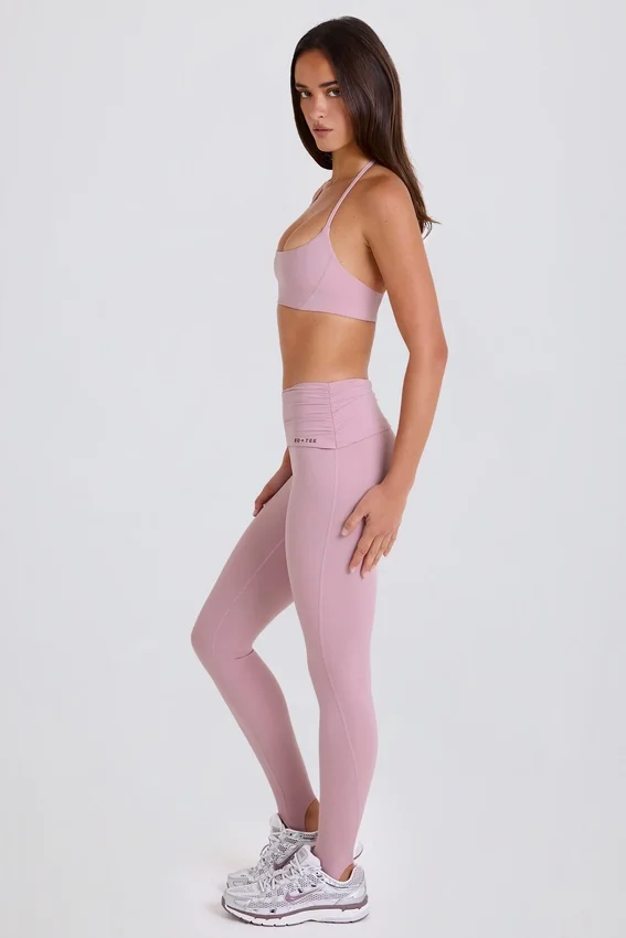 Foldover Mid-Rise Stirrup Leggings in Mauve Foldover Mid-Rise Stirrup Leggings in Mauve